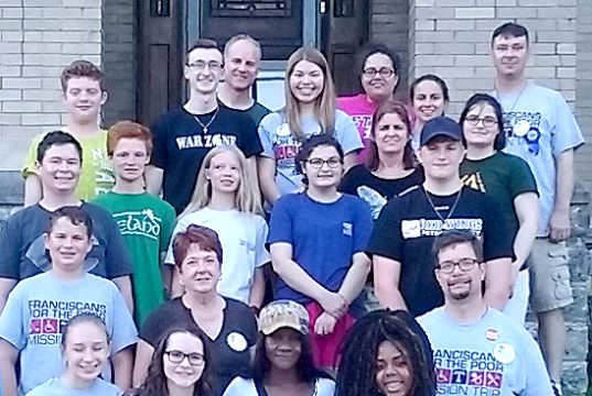 Melissa Mosby with a summer volunteer group from Wisconsin